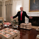 Trump showing off the last White House budget spoils.